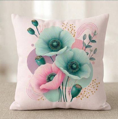 quadratischer Kissenbezug in mit modernem Mohnblumen-Design vor hellem Hintergrund. Das Motiv zeigt eine Komposition aus zwei großen türkisfarbenen und einer rosa Mohnblüte im Vordergrund, ergänzt durch grüne Kapseln, goldene Glitzerpunkte, feine rosa Linienbögen und abstrakte, sanft violette und türkise Farbflächen auf hellem Grund.