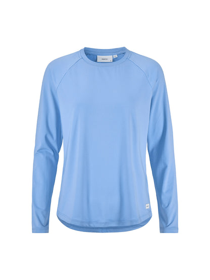 Langärmliges Sportshirt in der Farbe Blue Sky mit rundem Halsausschnitt, Raglanärmeln und locker körpernaher Passform. Der Saum ist leicht abgerundet und hinten etwas länger geschnitten.