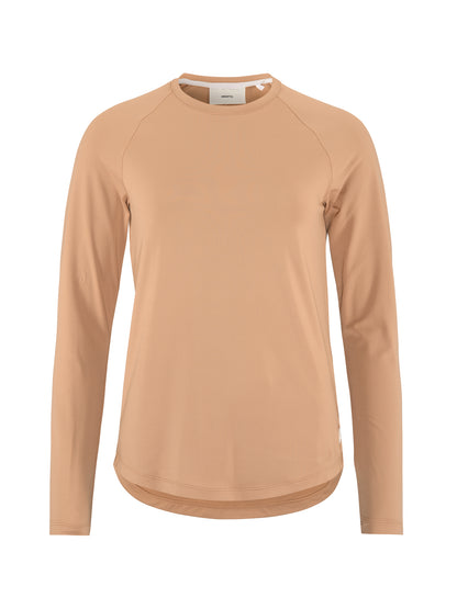 Langärmliges Sportshirt in der Farbe Syrup mit rundem Halsausschnitt, Raglanärmeln und locker körpernaher Passform. Der Saum ist leicht abgerundet und hinten etwas länger geschnitten.