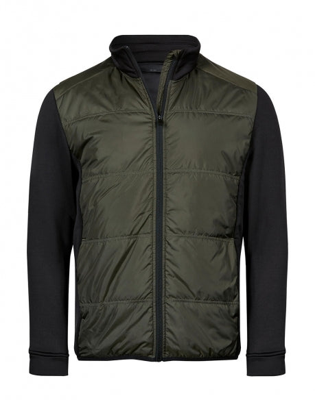 Herren Hybrid-Stretch-Jacke mit wattierter, quer gesteppter Vorderseite in Dunkelgrün, schwarzen Stretch-Ärmeln und seitlichen Einsätzen. Die Jacke ist körpernah geschnitten und hat einen hohen Stehkragen sowie einen durchgehenden Front Reißverschluss.