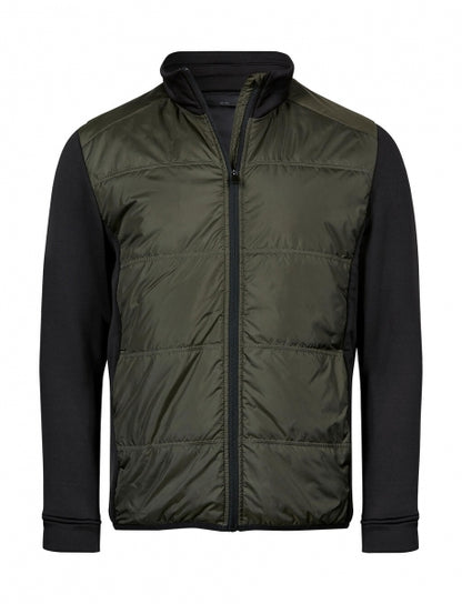 Herren Hybrid-Stretch-Jacke mit wattierter, quer gesteppter Vorderseite in Dunkelgrün, schwarzen Stretch-Ärmeln und seitlichen Einsätzen. Die Jacke ist körpernah geschnitten und hat einen hohen Stehkragen sowie einen durchgehenden Front Reißverschluss.
