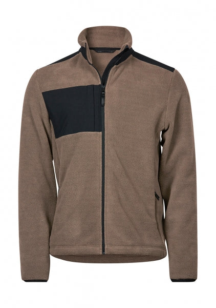 Mountain Fleecejacke in Deep Clay/Black mit schwarzem Reißverschluss und dunklen Kontrastbesätzen an Brust, Schultern und Ärmeln. Die hüftlange Jacke ist körpernah geschnitten, hat einen hohen Kragen und seitliche Reißverschlusstaschen.