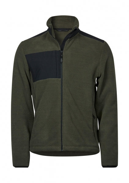 Mountain Fleecejacke in Deep Green/Black mit schwarzem Reißverschluss und dunklen Kontrastbesätzen an Brust, Schultern und Ärmeln. Die hüftlange Jacke ist körpernah geschnitten, hat einen hohen Kragen und seitliche Reißverschlusstaschen.