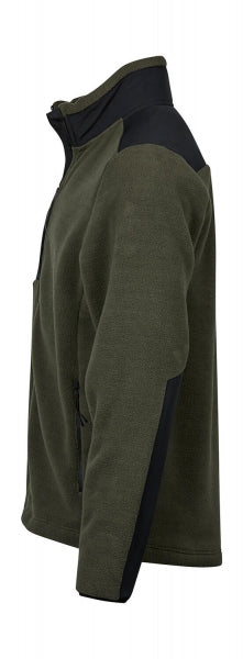 Mountain Fleecejacke in Deep Green/Black mit schwarzem Reißverschluss und dunklen Kontrastbesätzen an Brust, Schultern und Ärmeln. Die hüftlange Jacke ist körpernah geschnitten, hat einen hohen Kragen und seitliche Reißverschlusstaschen.