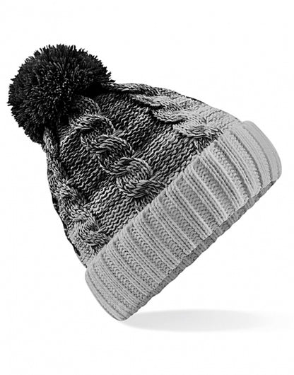 Unisex Strickmütze ins Schwarz Grau mit schwarzem Bommel und breitem Umschlag soweie strukturiertem Strickmuster.